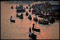River activity at sunrise. Can Tho, Vietnam (color)