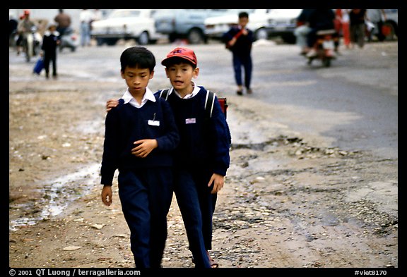 School children wear French-style chic sweaters. Da Lat, Vietnam (color)