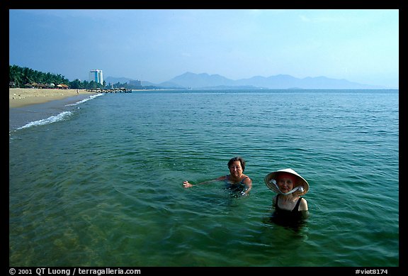 Early morning bath on a perfect beach Nha Trang. Vietnam