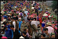 Colorful crowd at the sunday market, where people from the surrounding hamlets gather weekly to meet, shop and eat. Bac Ha, Vietnam