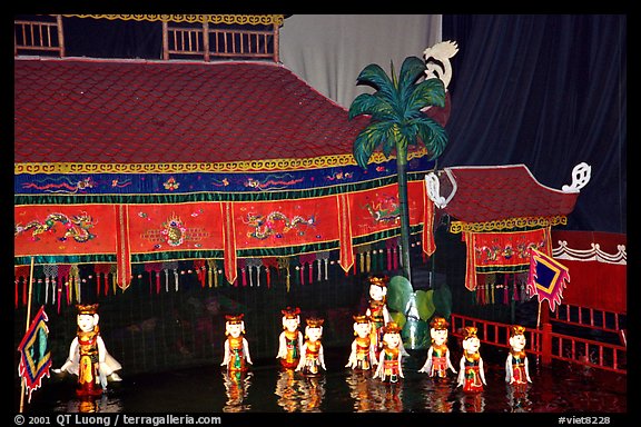 Water puppets performance. Artists are hidden behind the curtain and move the puppets with a complex system of sticks. Hanoi, Vietnam