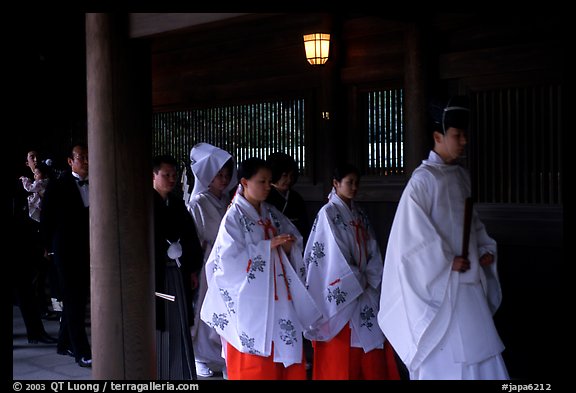 Shinto priest leads traditional wedding at the Meiji-jingu Shrine. Tokyo, Japan (color)