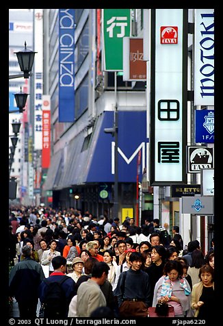 Crowds in the Ginza shopping district. Tokyo, Japan