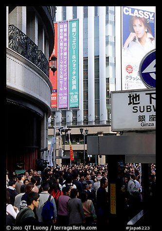 Crowds on the street near the Ginza subway station. Tokyo, Japan (color)