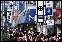 Crowded avenue in the Ginza shopping district. Tokyo, Japan