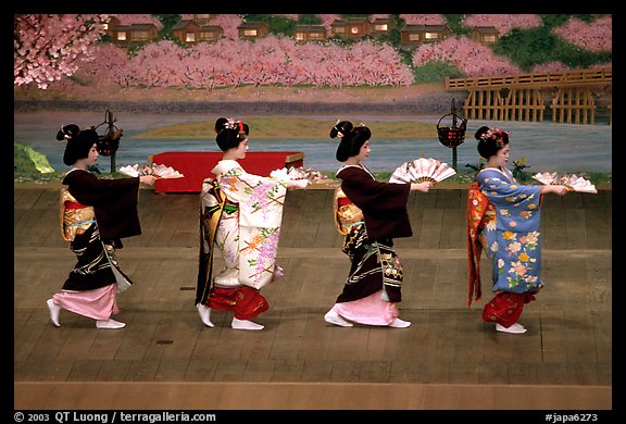 Maiko (apprentice Geisha) dress elaborately to perform the Miyako Odori (cherry blossom dance). Kyoto, Japan (color)