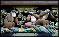 Three-monkey relief carving (hear no evil, see no evil, speak no evil) on Shinkyusha. Nikko, Japan (color)