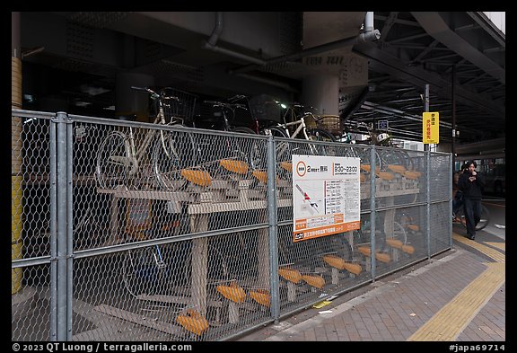 Stacked bicycle parking on the street. Tokyo, Japan (color)