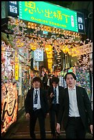 Men in suits at Omoide Yokocho at night, Shinjuku. Tokyo, Japan ( color)