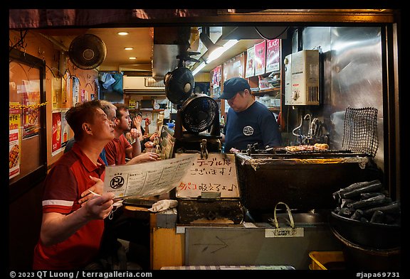 Izakaya food stall, Omoide Yokocho, Shinjuku. Tokyo, Japan (color)