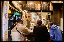 Tiny open restaurant serving noddles, Omoide Yokocho, Shinjuku. Tokyo, Japan ( color)