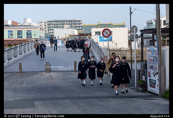 Schoolchildren walk over the Benten Bridge. Fujisawa, Japan (color)