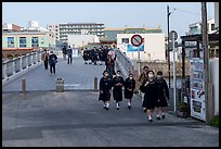 Schoolchildren walk over the Benten Bridge. Fujisawa, Japan ( color)