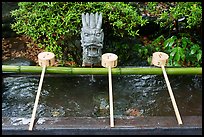 Containers for ritual cleansing. Enoshima Island, Japan ( color)