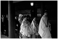 Shinto priest leads traditional wedding at the Meiji-jingu Shrine. Tokyo, Japan (black and white)