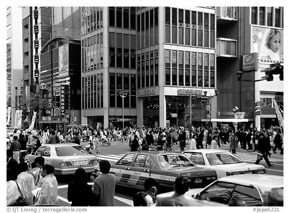 Crowded crossing in Ginza shopping district. Tokyo, Japan (black and white)