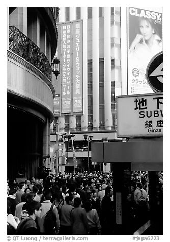 Crowds on the street near the Ginza subway station. Tokyo, Japan (black and white)
