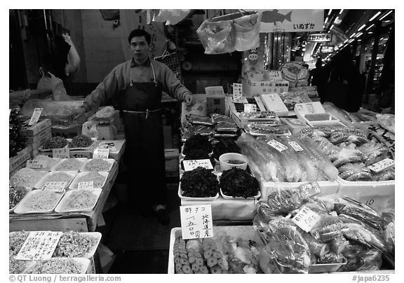 Seafood vendor in a popular street. Tokyo, Japan (black and white)