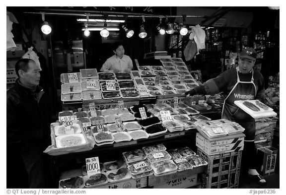 Seafood store in a popular street. Tokyo, Japan (black and white)