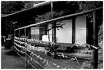 Prayer notes in a temple. Kyoto, Japan ( black and white)