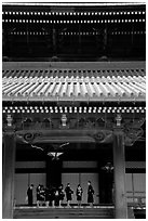 Uniformed schoolgirls visit Higashi Hongan-ji Temple. Kyoto, Japan ( black and white)