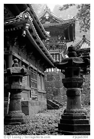 Urns, pavilion, and main hall in Tosho-gu Shrine. Nikko, Japan