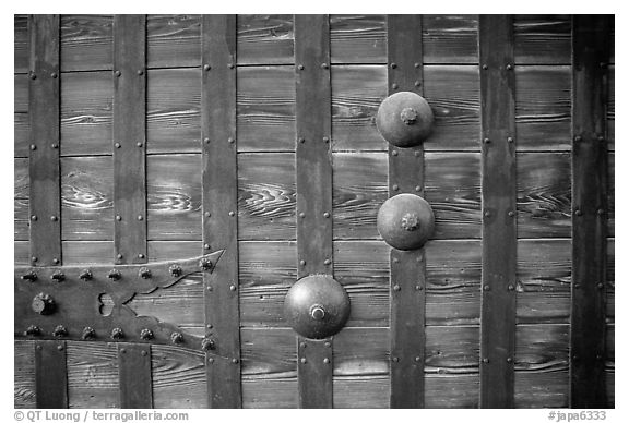 Detail of heavy wooden door. Himeji, Japan