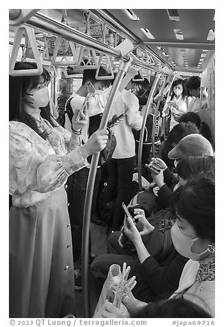 Riding the Tokyo subway. Tokyo, Japan (black and white)