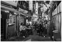 Yakitori Alley at night, Shinjuku. Tokyo, Japan ( black and white)