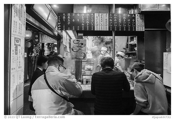 Tiny open restaurant serving noddles, Omoide Yokocho, Shinjuku. Tokyo, Japan