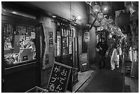 Omoide Yokocho alley lined up with eateries, Shinjuku. Tokyo, Japan ( black and white)