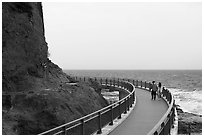 Walkway to Enoshima Iwaya Caves. Enoshima Island, Japan ( black and white)