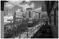 Toyosu street with train and TeamLab building. Tokyo, Japan ( black and white)