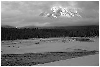 River, snow, and peak emerging from clouds. Banff National Park, Canadian Rockies, Alberta, Canada (black and white)