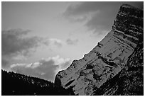Sunrise and craggy mountain. Banff National Park, Canadian Rockies, Alberta, Canada ( black and white)