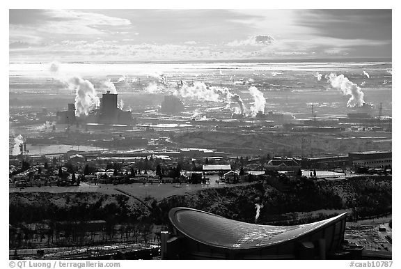 Stadium and industrial exhaust seen from the Tower. Calgary, Alberta, Canada (black and white)