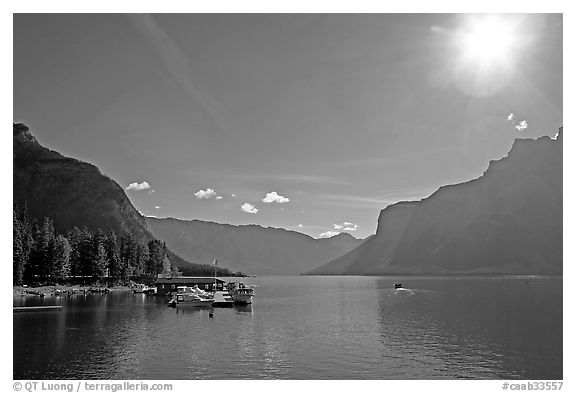 Lake Minnewanka (only lake in the Park that allows motorized boats) and marina, morning.. Banff National Park, Canadian Rockies, Alberta, Canada (black and white)