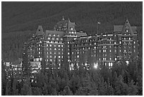 Banff Springs Hotel at dusk. Banff National Park, Canadian Rockies, Alberta, Canada ( black and white)