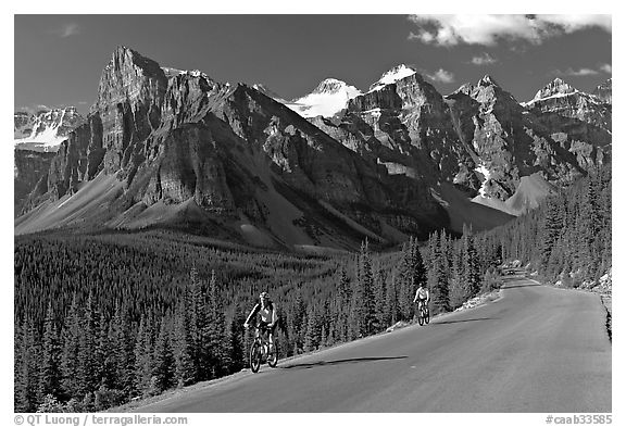 Cyclists on the road to the Valley of Ten Peaks. Banff National Park, Canadian Rockies, Alberta, Canada (black and white)