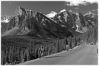 Cyclists on the road to the Valley of Ten Peaks. Banff National Park, Canadian Rockies, Alberta, Canada ( black and white)