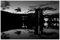 Chateau Lake Louise Hotel reflected in Lake at night. Banff National Park, Canadian Rockies, Alberta, Canada (black and white)