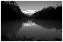 Lake Louise and Victoria Peak, early morning. Banff National Park, Canadian Rockies, Alberta, Canada (black and white)