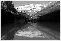 Victoria peak reflected in Lake Louise, early morning. Banff National Park, Canadian Rockies, Alberta, Canada (black and white)