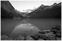 Boulders, Victoria Peak, and Lake Louise, sunrise. Banff National Park, Canadian Rockies, Alberta, Canada (black and white)