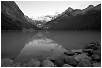 Boulders, Victoria Peak, and Lake Louise, sunrise. Banff National Park, Canadian Rockies, Alberta, Canada ( black and white)