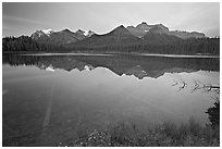 Bow range reflected in Herbert Lake, dawn. Banff National Park, Canadian Rockies, Alberta, Canada ( black and white)