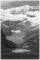 Distant view of Lake Louise and  Victoria Peak from the ski resort. Banff National Park, Canadian Rockies, Alberta, Canada (black and white)