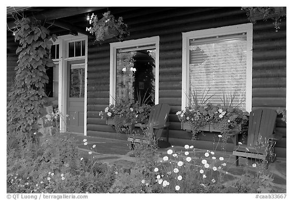 Porch of a cabin with flowers. Banff National Park, Canadian Rockies, Alberta, Canada (black and white)