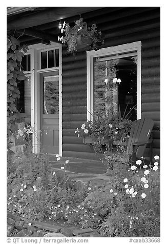 Flowered porch of a wooden cabin. Banff National Park, Canadian Rockies, Alberta, Canada (black and white)