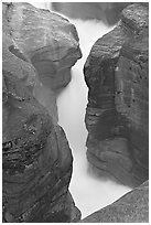 River flowing through narrow slot, Mistaya Canyon. Banff National Park, Canadian Rockies, Alberta, Canada (black and white)